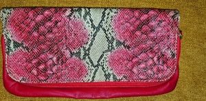 Snakeskin printed clutch